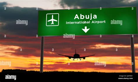 Airplane silhouette landing in Abuja, Nigeria. City arrival with airport direction signboard and ...