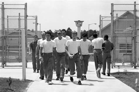 Florida Memory • Group of inmates by the gate at Holmes Correctional ...