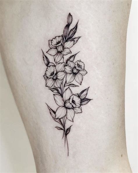 101 Amazing Daffodil Tattoo Designs You Need To See! | Daffodil tattoo, Flower wrist tattoos ...