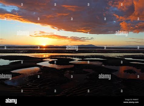 Allonby beach sunset in the lake district Stock Photo - Alamy