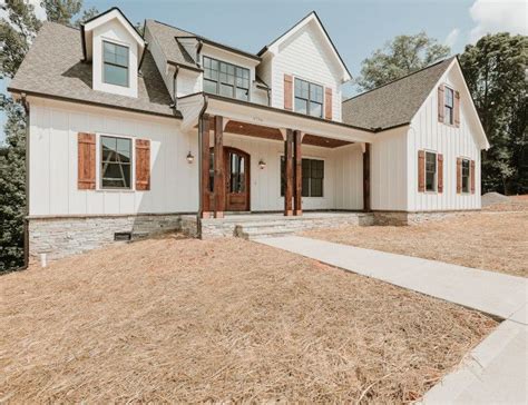 White Modern Farmhouse White Farmhouse White Farmhouse exterior with Wood Accents Wood Porch ...