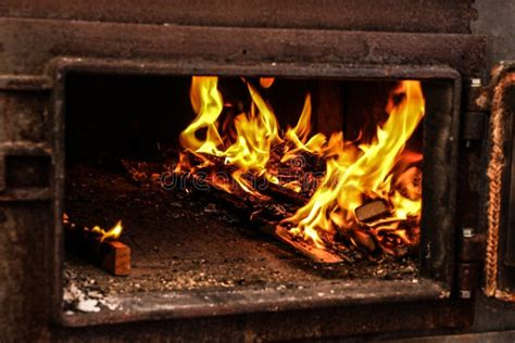 Wood fire in the oven stock image. Image of cook, home - 173977335