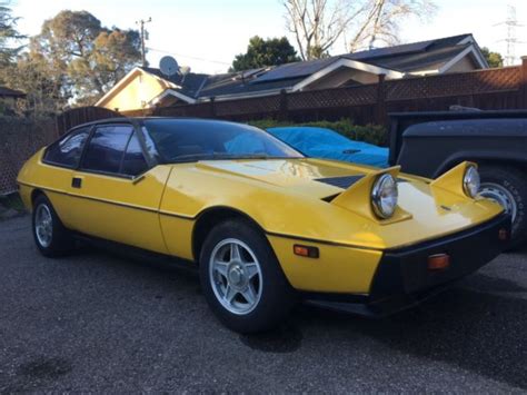 1976 Yellow Lotus Eclat with an spare Lotus Eclat car, for restoration ...