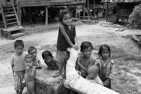 "Laos children in remote village on the upper Mekong Delta River" by ...