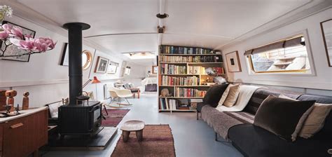 Solar-powered houseboat boasts spectacular interior design