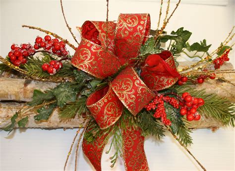 LOG CHRISTMAS CENTERPIECES | ... Designer Made Decorative Yule Logs make a great centerpiece ...