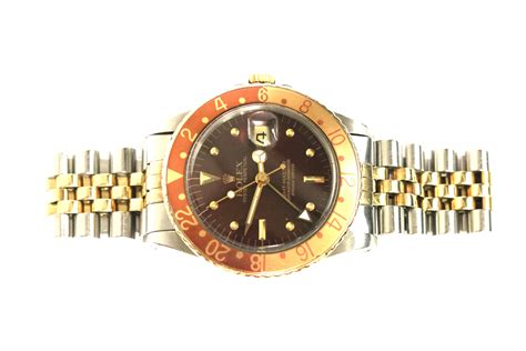 Rolex 40mm GMT Master Root Beer - Pearson's Jewelry