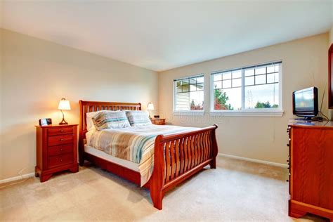 Warm Colors Bedroom with Wood Furniture Stock Image - Image of american ...