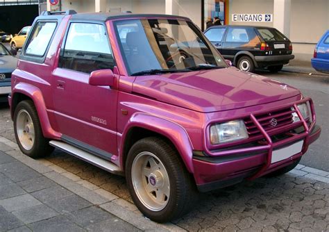 Purple Suzuki Vitara Parked on the Side of the Road