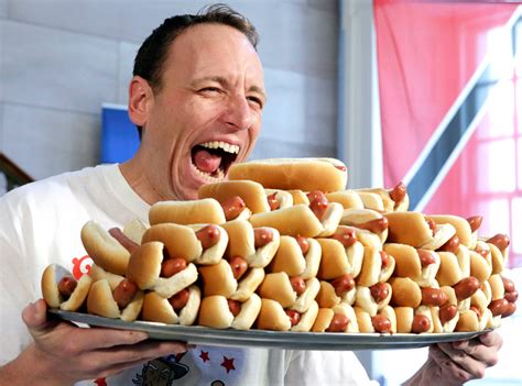 Joey Chestnut Wins Nathan's Hot Dog Eating Contest for the 10th Time | E! News