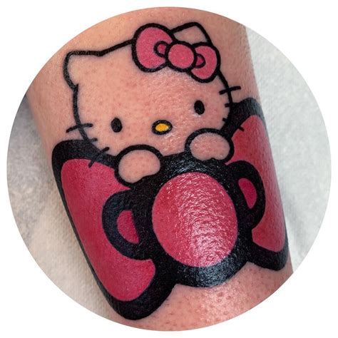 Hello Kitty pink bow tattoo - girly tattoos | Pink bow tattoos, Girly tattoos, Bow tattoo