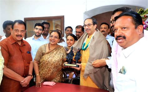 Shiv Sena (UBT) chief Uddhav Thackeray being felicitated during a ...