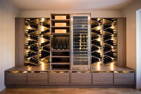 Large custom wine storage unit makes attractive living room… | Wine ...