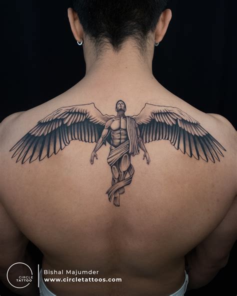 Share 66+ guardian angel back tattoo best - vova.edu.vn