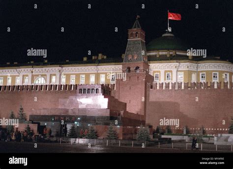 A nighttime view in Red Square showing the Lenin Mausoleum. Behind the ...