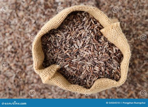 Brown rice in sack bag stock photo. Image of food, health - 54504518