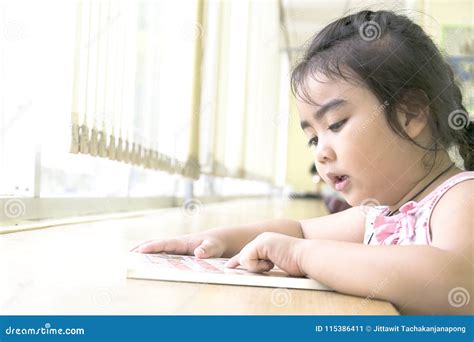 The Children are Reading Books in the Library. Stock Image - Image of colorful, indoors: 115386411