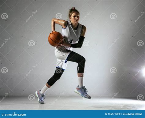 Young Caucasian Female Basketball Player Against White Wall Background ...