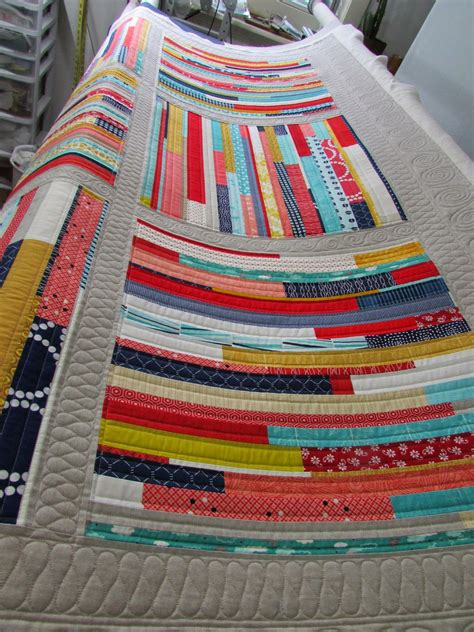 The Quilting Mill: "Woven" quilt by Kati Spencer in Scraps, Inc.