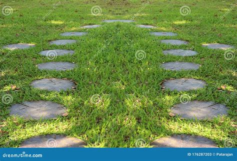 Paving Stone Tile Walkway on Green Yard in the Garden. Stock Image ...