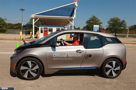 Golf PROs Rory McIlroy and Gary Woodland racing in BMW i3 electric vehicles