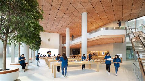 India's first Apple Store topped by complex 450,000-piece timber ceiling