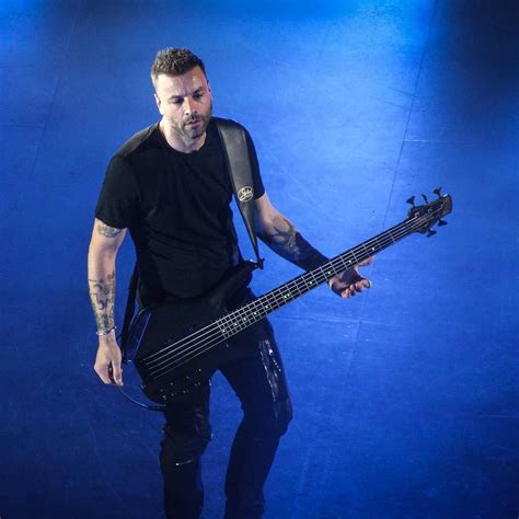 Chris Wolstenholme #Muse | Men, Muse, Mens tops