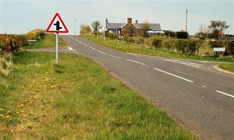 Staggered crossroads sign, Islandmagee © Albert Bridge cc-by-sa/2.0 :: Geograph Britain and Ireland