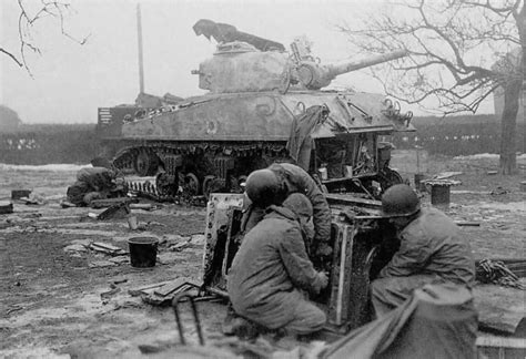 M4 105 mm Sherman Tank Crew Makes Repairs | World War Photos