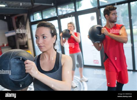 people training at a gym Stock Photo - Alamy