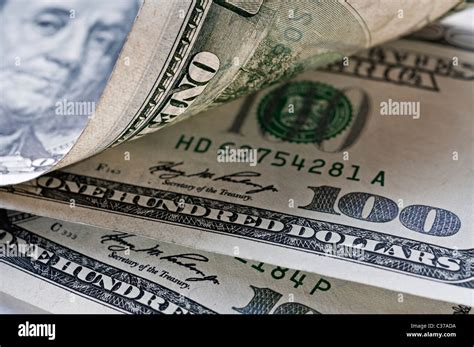 A close up of several US $100 dollar bills Stock Photo - Alamy