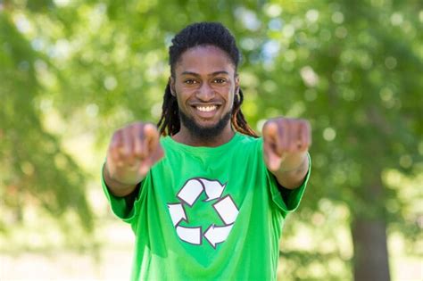 Premium Photo | Happy environmental activist in the park