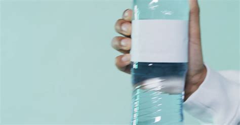 A Person Holding Bottled Water · Free Stock Video