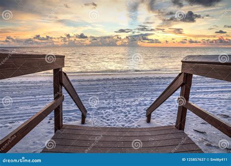 Boardwalk Leading To the Ocean at Vanderbilt Beach at Sunset Stock ...