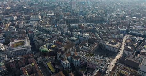 Aerial view of Milan city from above. Flying over Milan city center ...