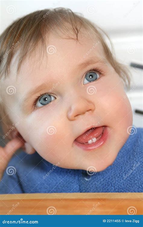 Baby with two teeth stock image. Image of girl, small - 2211455