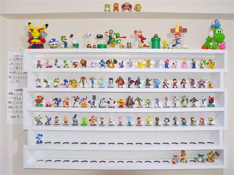 Filling up Amiibo shelves. Clean organized display via Reddit user ...