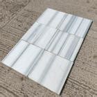 Large marble floor tiles with grey stripes