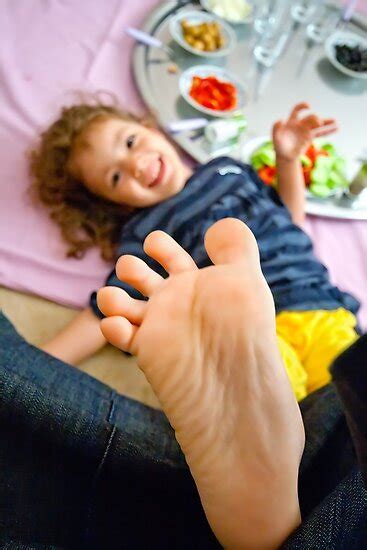 "Little Girl Playing Footsie" Poster by Kuzeytac | Redbubble