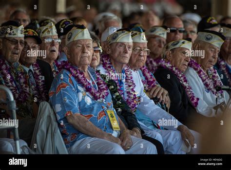 U.S. World War II veterans and Pearl Harbor survivors listen to guest speakers during the 75th ...