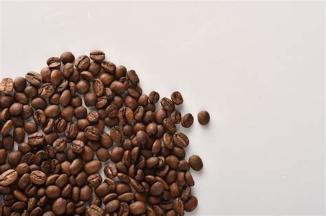 Premium Photo | Coffee beans isolated on a black background