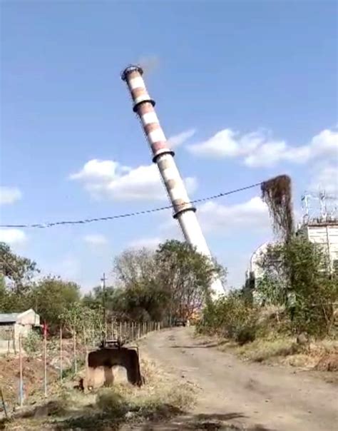 After a long tussle, Solapur factory's 92-m tall chimney razed to ...