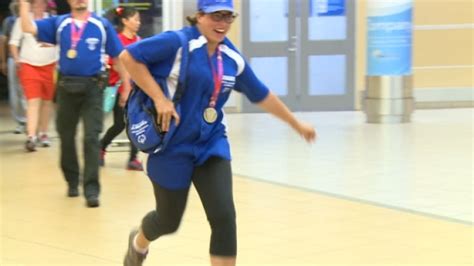 Special Olympics athletes receive warm welcome home | CBC News