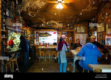 Visitors dining inside the Swiftwater Seafood Cafe, Whittier, Alaska Stock Photo, Royalty Free ...