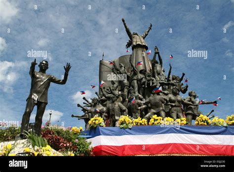 The EDSA Revolution Monument adorned with flowers during the 29th ...