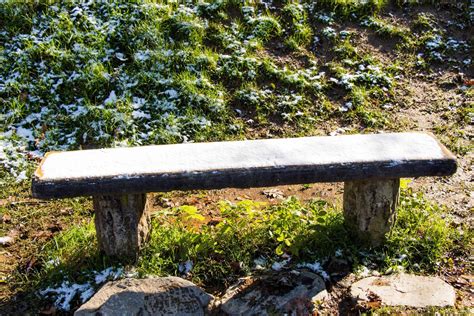 Wooden park bench at a park 14877446 Stock Photo at Vecteezy