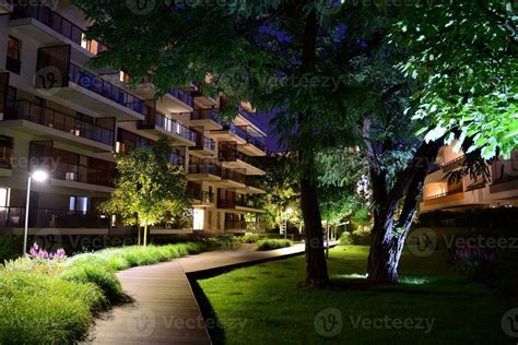 Exterior of apartment building at night 27852666 Stock Photo at Vecteezy