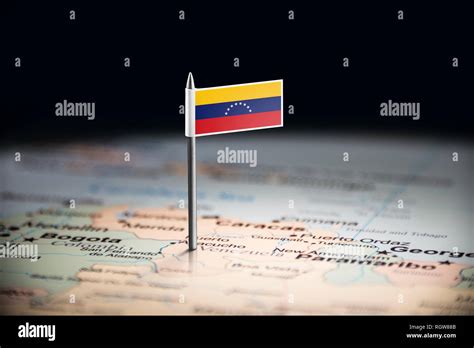 Venezuela marked with a flag on the map Stock Photo - Alamy