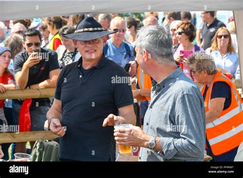 Beaminster, Dorset, UK. 19th August 2018. UK Weather. Actor Martin Clunes with Actor Neil ...