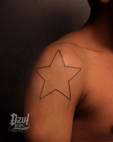 black star tattoo | Black star tattoo, Star tattoos, Tattoos for black skin